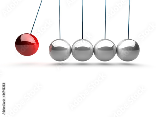 balancing balls newtons cradle over white background photo