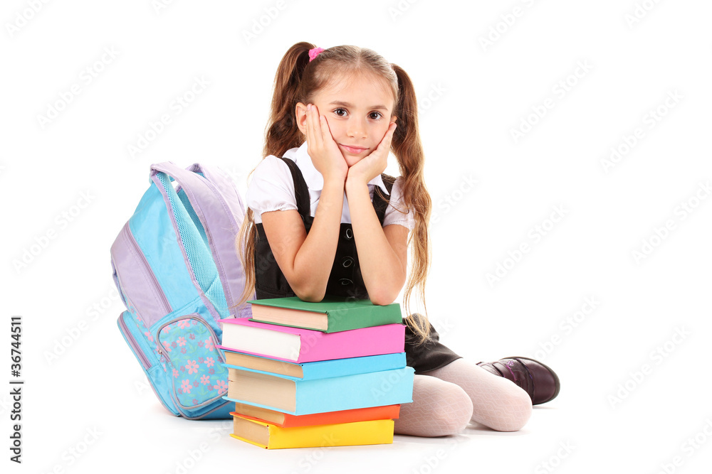 beautiful little girl, books and a backpack isolated on white beautiful little girl, books and a backpack isolated on white