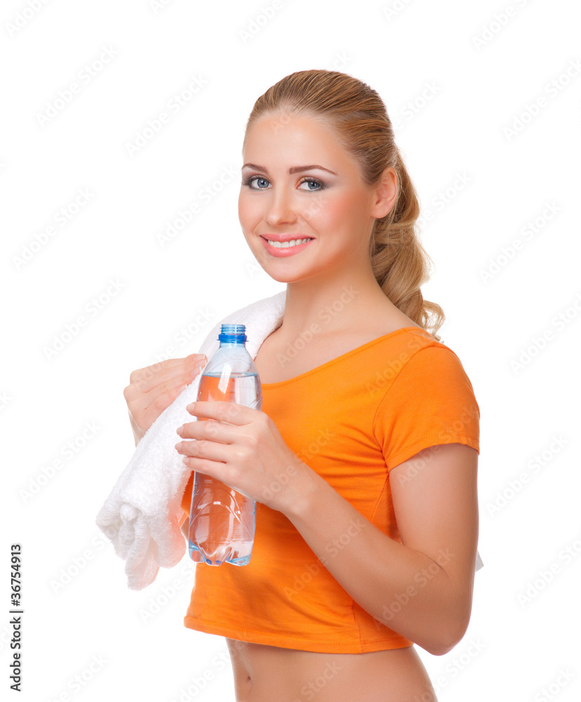 Young woman with towel and bottle with water Young woman with towel and bottle with water