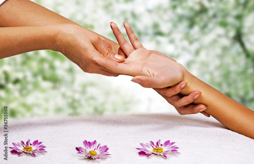 Hands massage in the spa salon