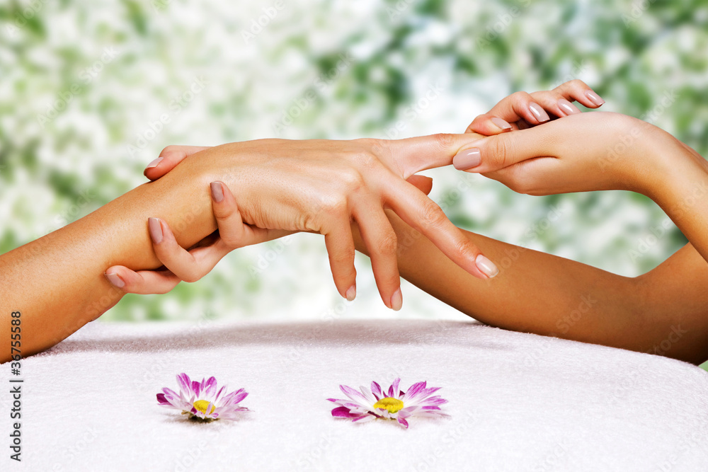 Hands massage in the spa salon