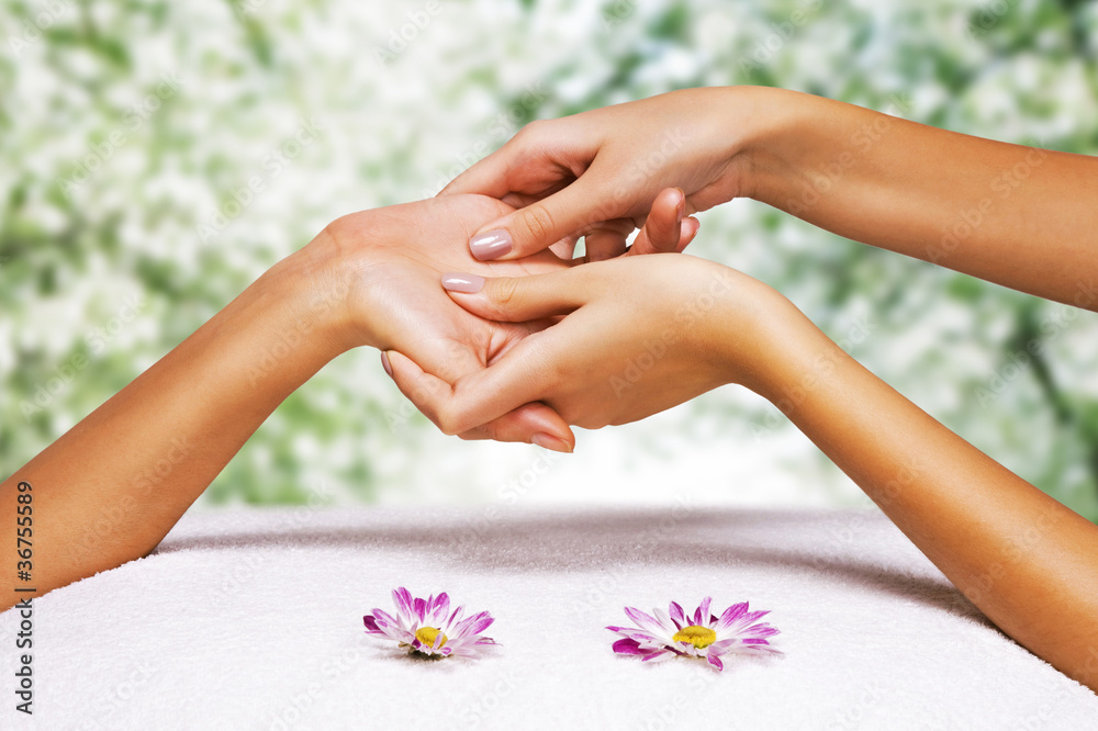 Hands massage in the spa salon