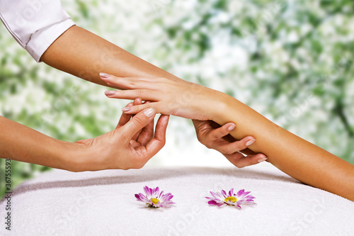 Fototapeta Naklejka Na Ścianę i Meble -  Hands massage in the spa salon