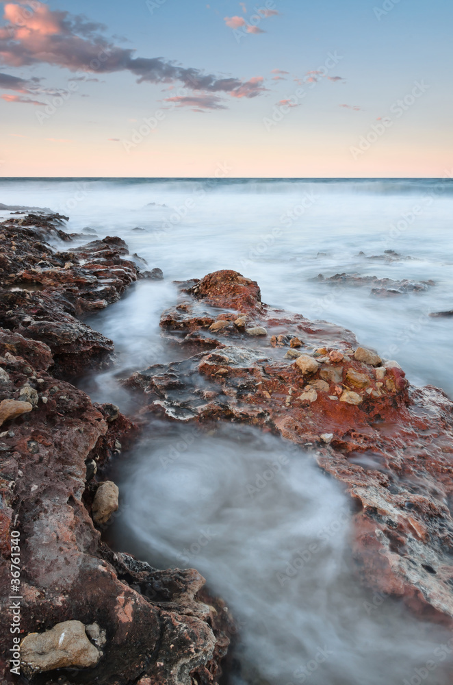 Fototapeta premium vertical seascape at sunset