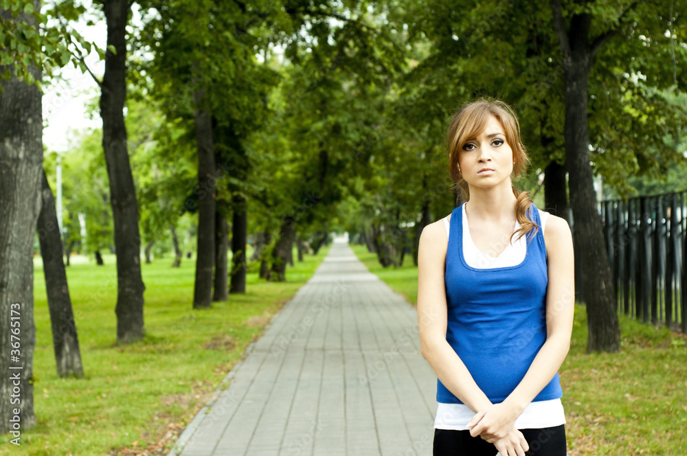 portrait Young woman in summer park portrait Young woman in summer park
