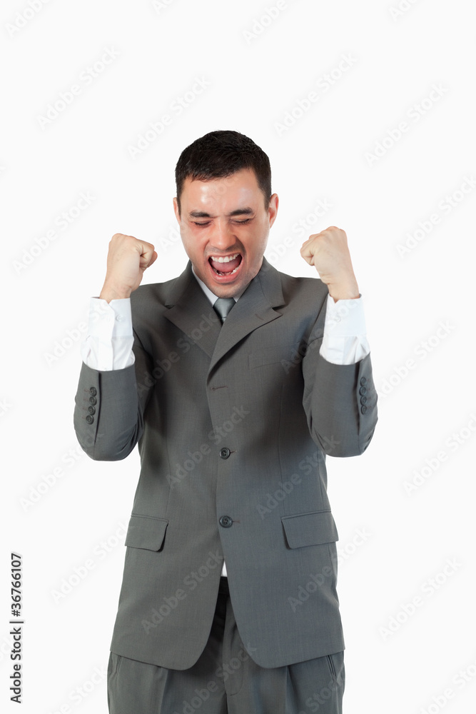 Portrait of a businessman with the fists up Portrait of a businessman with the fists up
