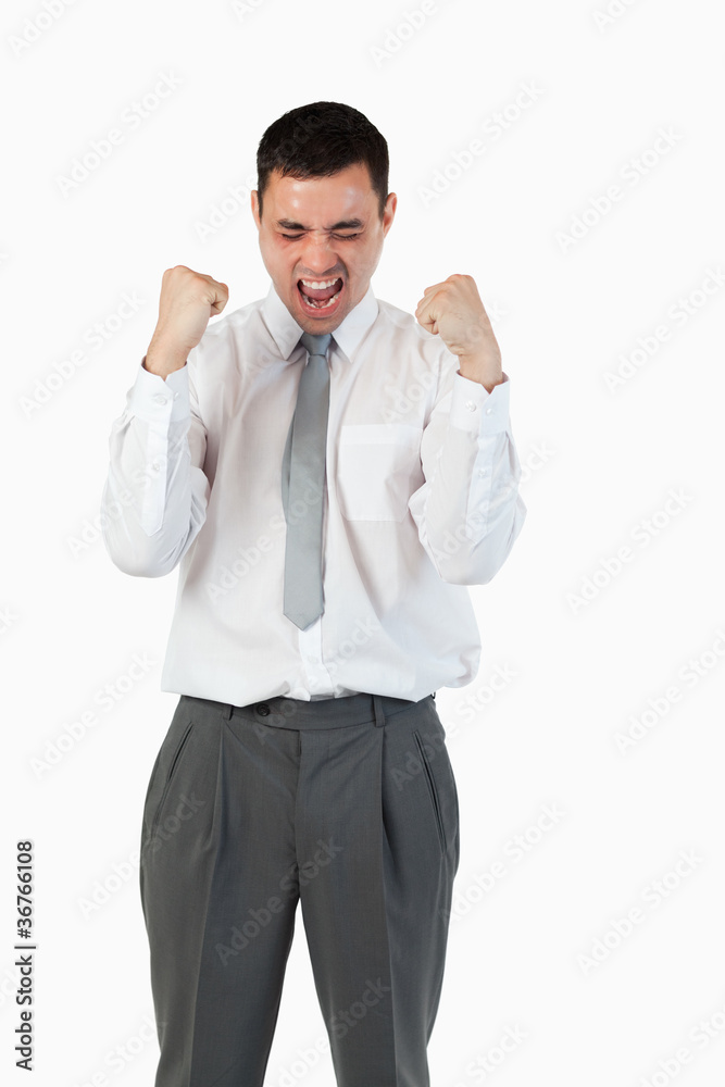 Portrait of a young businessman with the fists up Portrait of a young businessman with the fists up