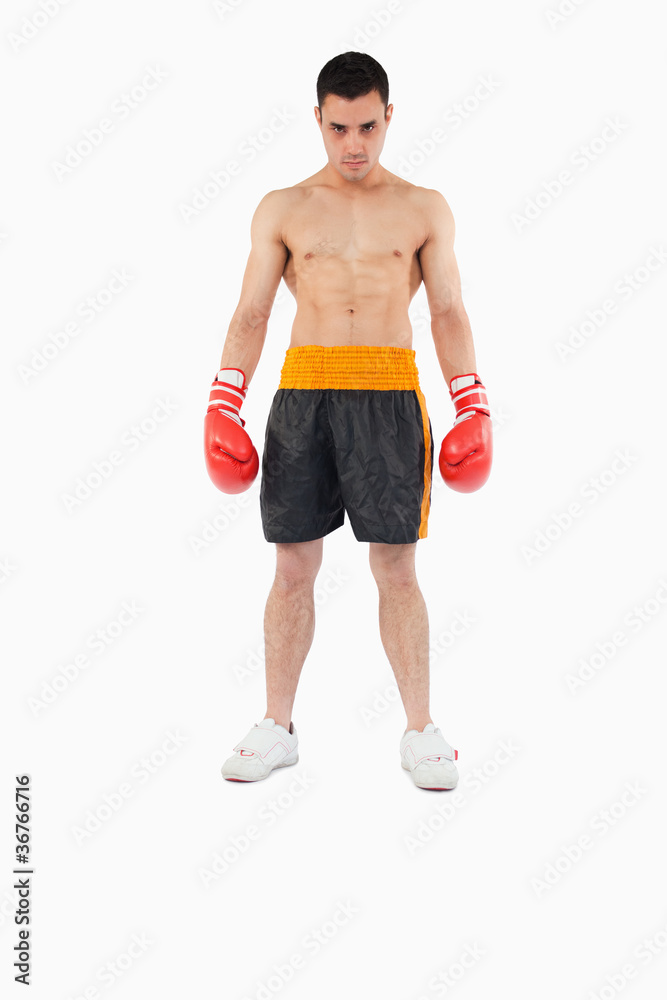 Young boxer with strong fighting spirit Young boxer with strong fighting spirit