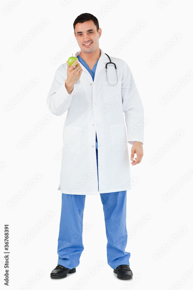 Portrait of a doctor with an apple Portrait of a doctor with an apple
