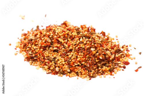 photo of multi-colored spices on white background