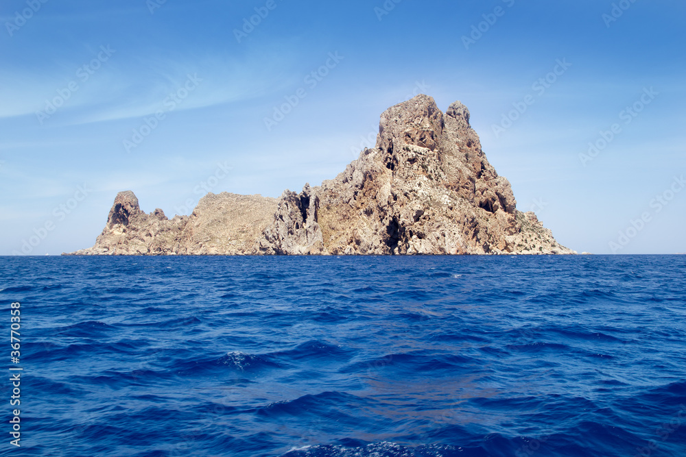 Ibiza Es Vedra island in Mediterranean blue