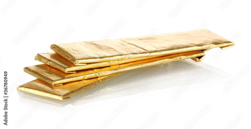 chewing gums wrapped in golden foil, isolated on white