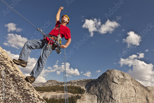 Climber rappelling from the summit.