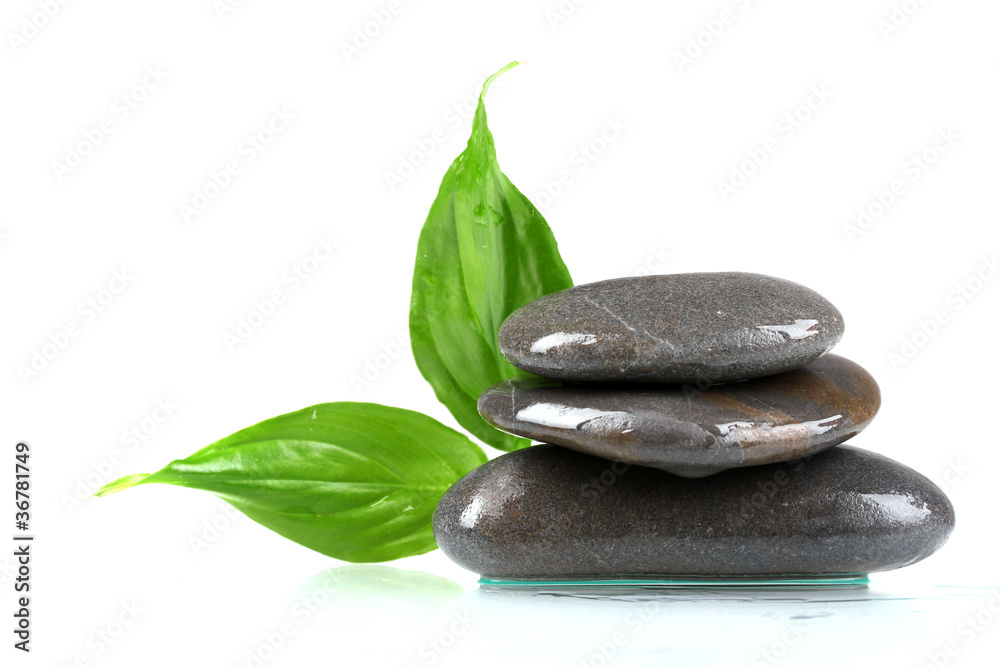 Fototapeta premium spa stones and leaves isolated on white