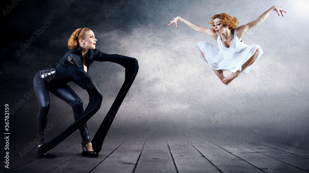 Black and White Dancers in posing on background Black and White Dancers in posing on background
