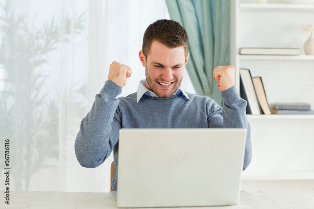 Businessman having success in his homeoffice Businessman having success in his homeoffice