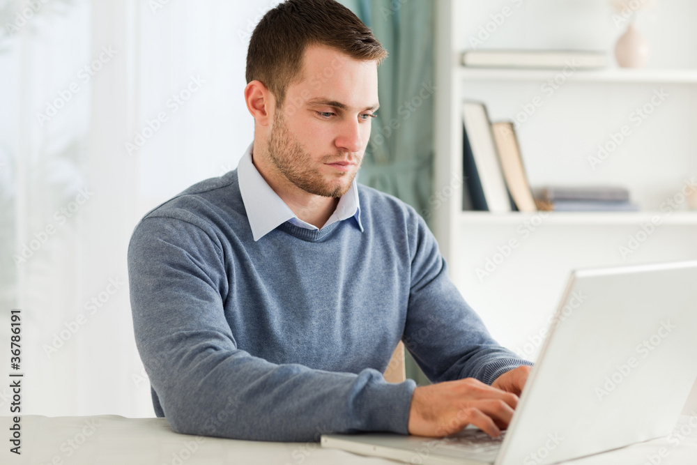 Man working on his notebook