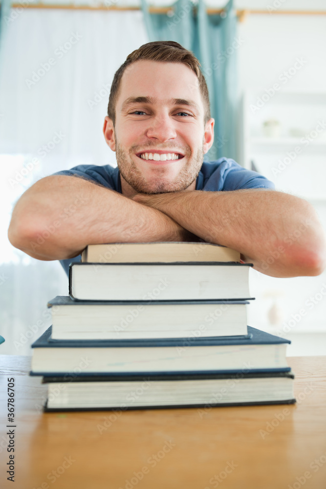 Happy student with his books Happy student with his books