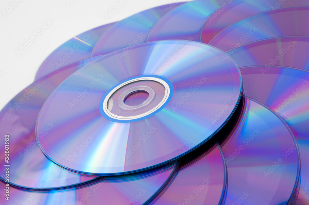 background of some colorful compact discs background of some colorful compact discs
