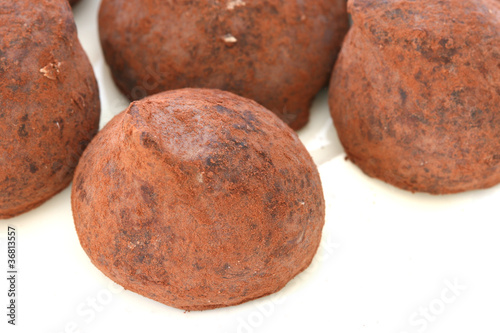 Chocolate truffle pralines sweets covered in cocoa powder