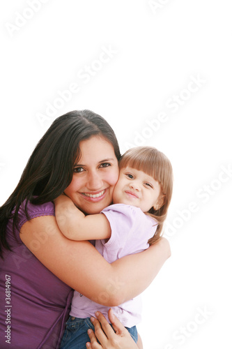 Portrait of happy mother and her smiling daughter