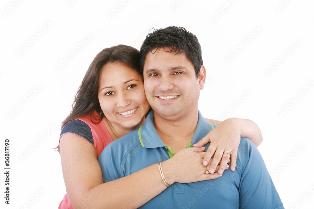 Portrait of a beautiful young happy smiling couple - isolated Portrait of a beautiful young happy smiling couple - isolated