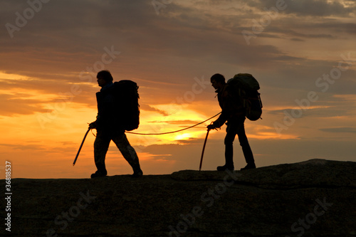 Silhouette two climbers outdoor