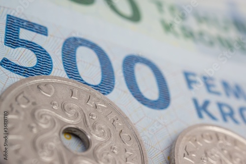 Close up of danish kroner, coins and bank notes photo