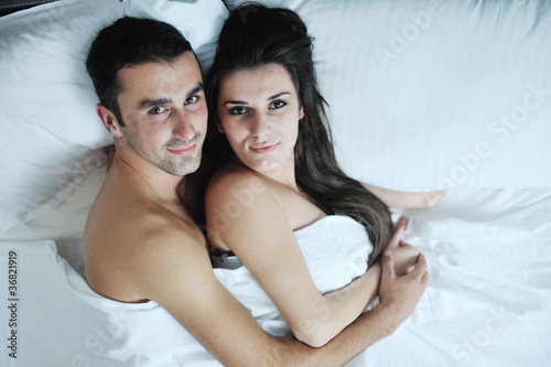 young couple have good time in their bedroom