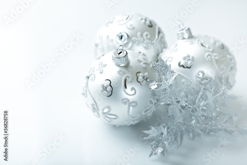 Silver christmas balls on white background