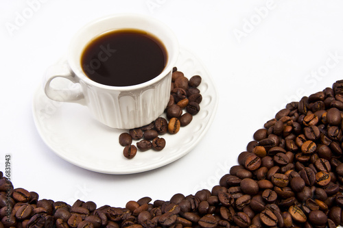 taza de café con granos tostados