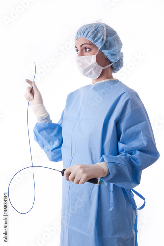 Female doctor or nurse holding a catheter