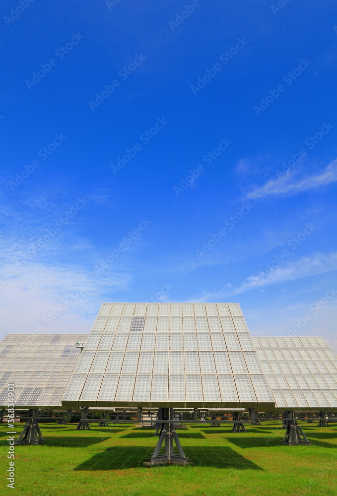 Solar Panel with green grass and beautiful blue sky Solar Panel with green grass and beautiful blue sky