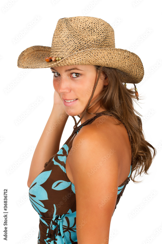 Jeune fille porte un chapeau et une robe Jeune fille porte un chapeau et une robe