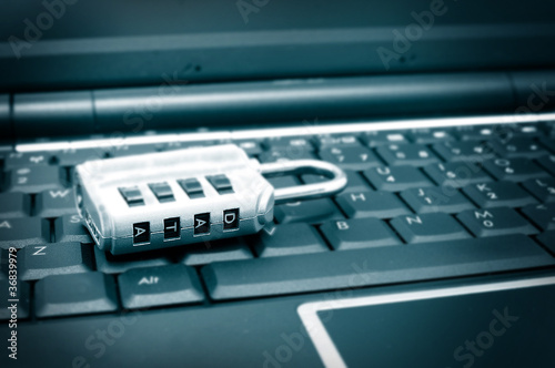 Wallpaper Mural lock with password on a computer keyboard Torontodigital.ca