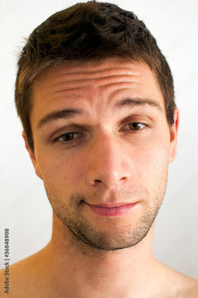 Extremely tired man with half open eyes Extremely tired man with half open eyes