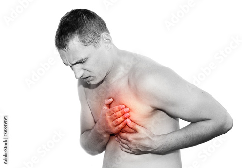 Young man having heart attack