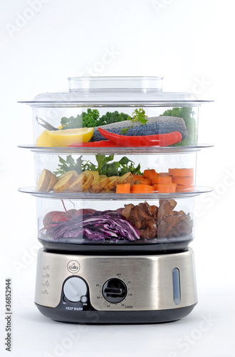 steam cooker with vegetables and fish