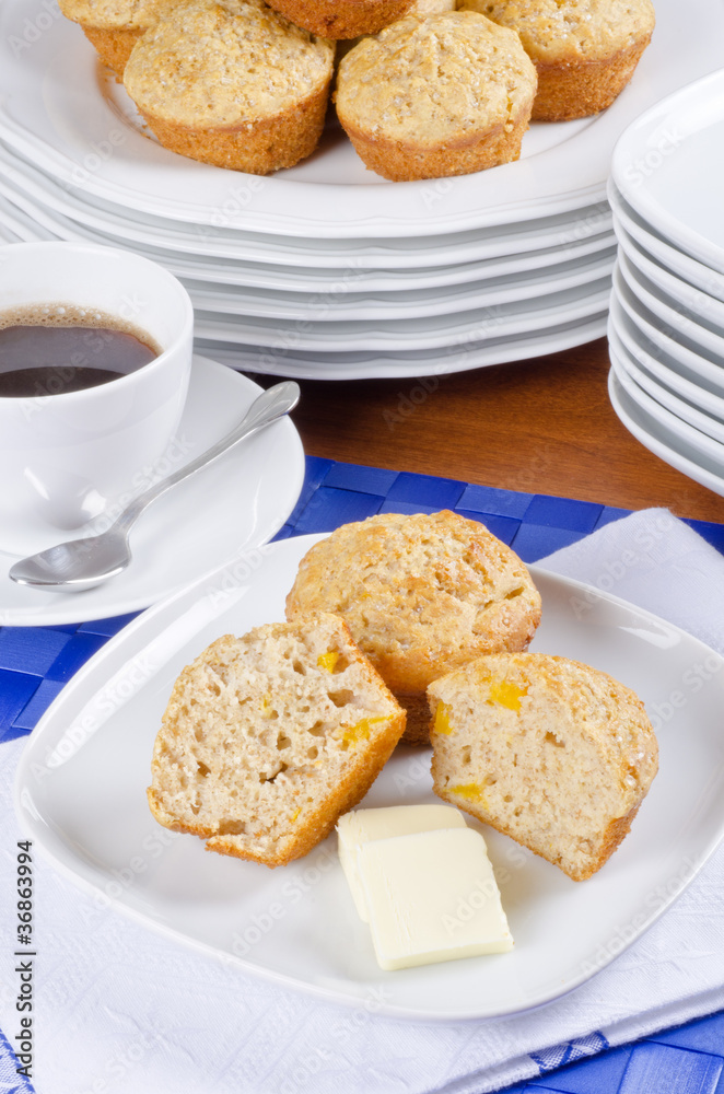 Homemade Peach Muffins Served with Butter and Coffee Homemade Peach Muffins Served with Butter and Coffee