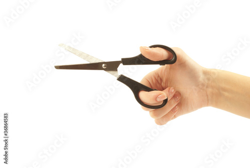 Scissors in hand isolated on white background