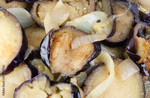 sliced and fried eggplants and onion as  background