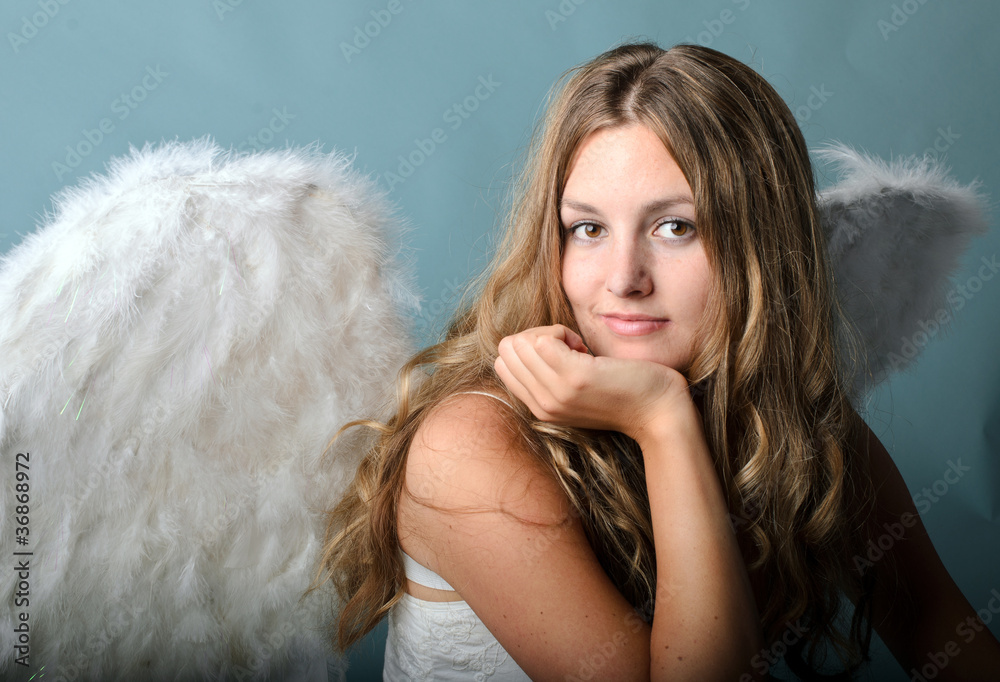 Christmas: Wonderful serious-looking angel Christmas: Wonderful serious-looking angel
