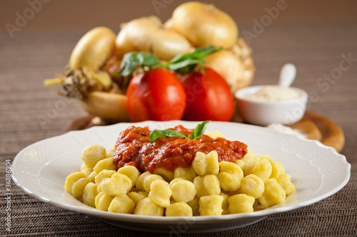 Freshly cooked homemade gnocchi pasta with ingredients