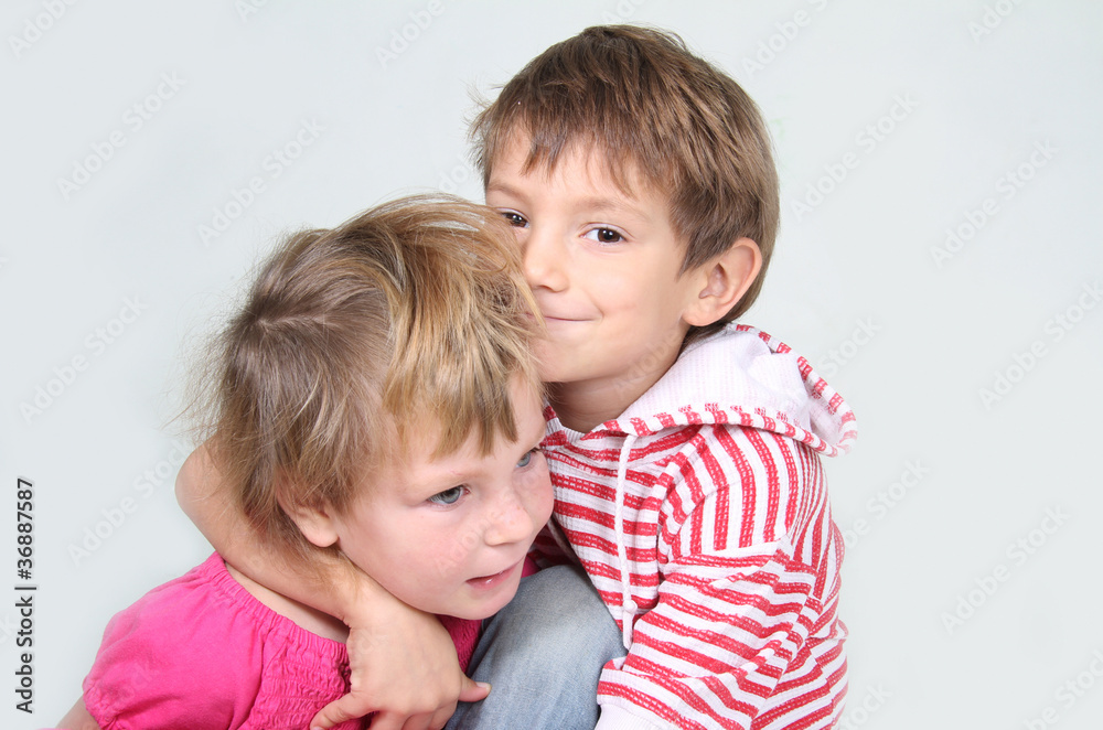 young brother and sister studio shot young brother and sister studio shot