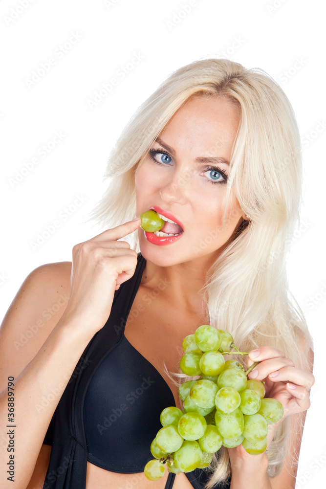 blonde in sexy black bathing suit eating grapes blonde in sexy black bathing suit eating grapes