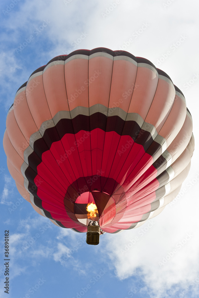 Fototapeta premium Photographer shooting from hot balloon in the sky.