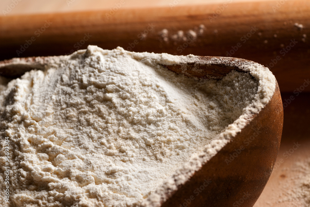Wooden pin and flour Wooden pin and flour