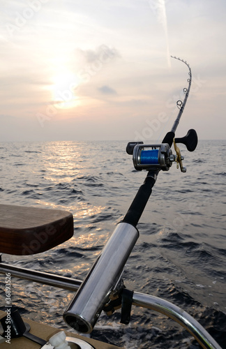 Single fishing-rod on a boat