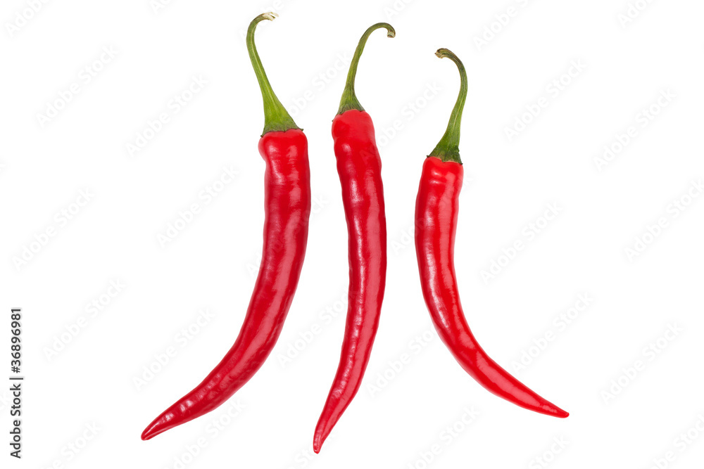 Three bright red chili peppers