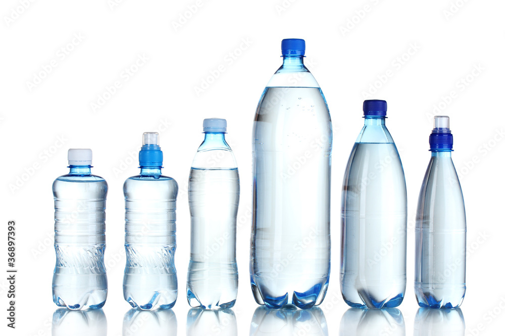 Group plastic bottles of water isolated on white
